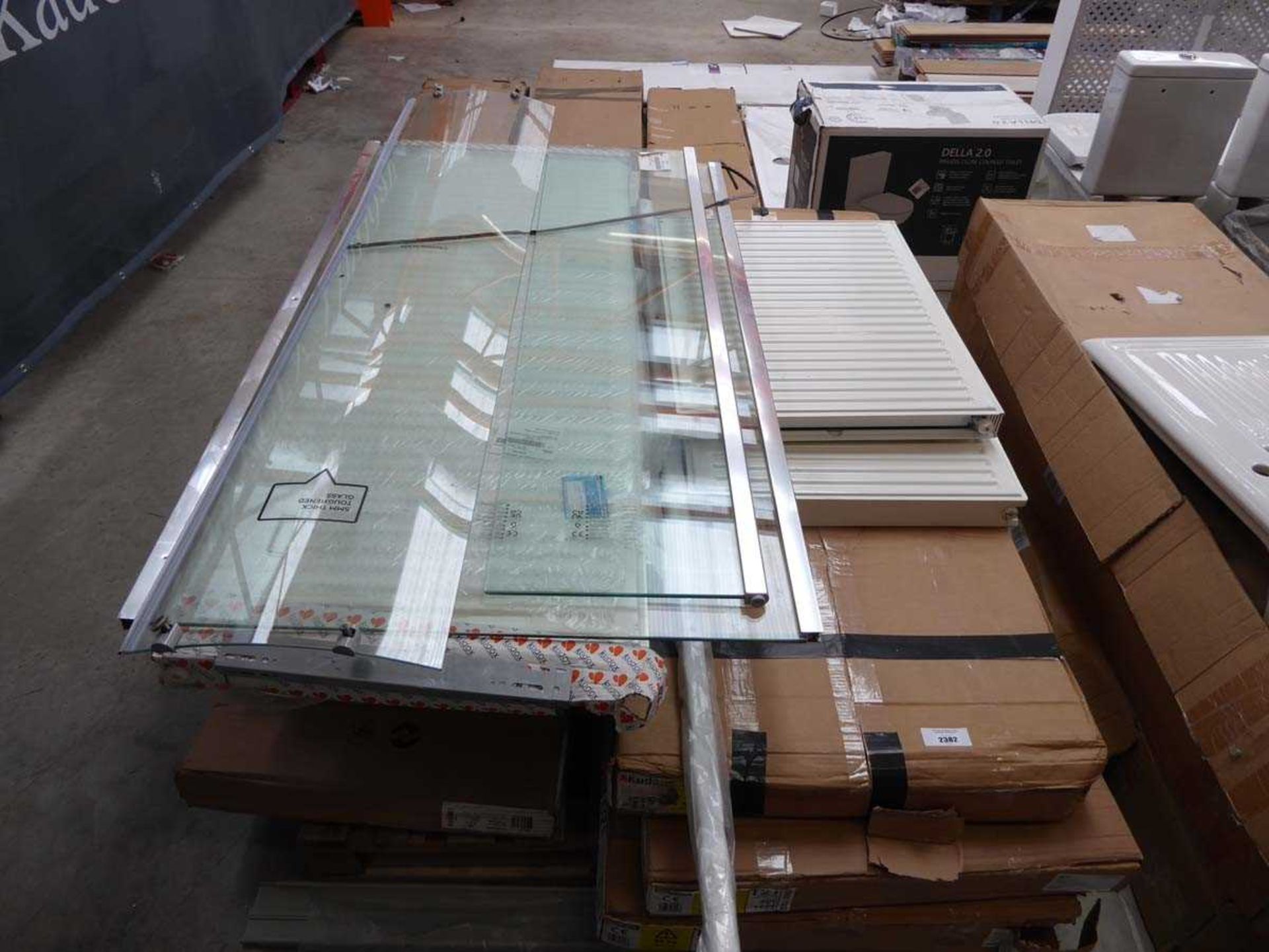 +VAT Pallet containing a qty of mixed size radiators and unboxed shower