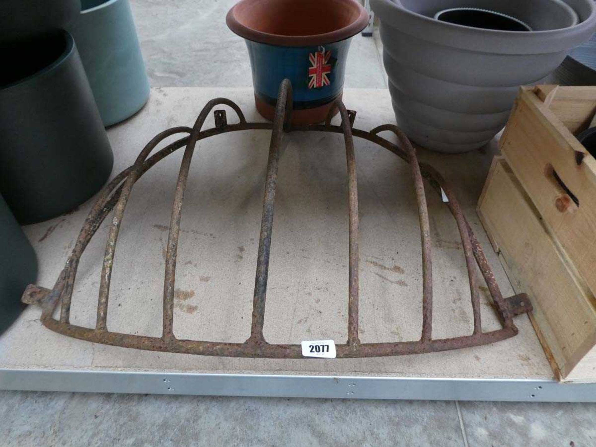 Wrought iron wall mounted hay rack