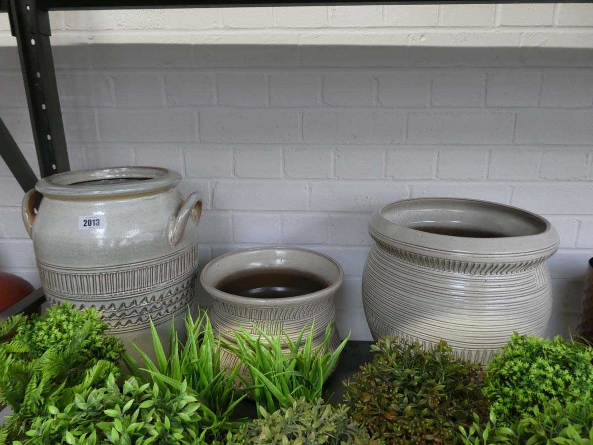 3 cream coloured glazed ceramic garden pots