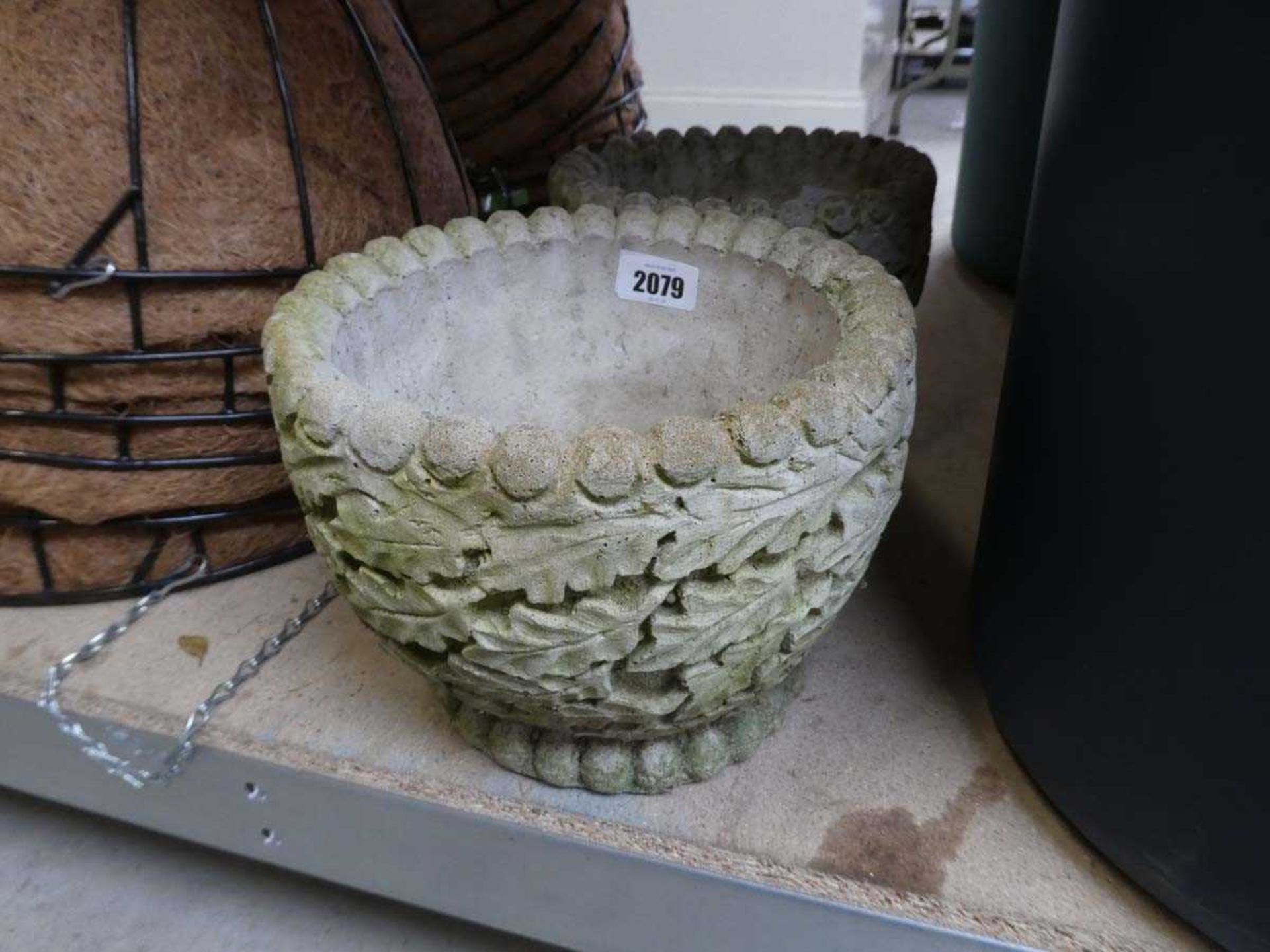 Pair of decorative floral patterned concrete planters