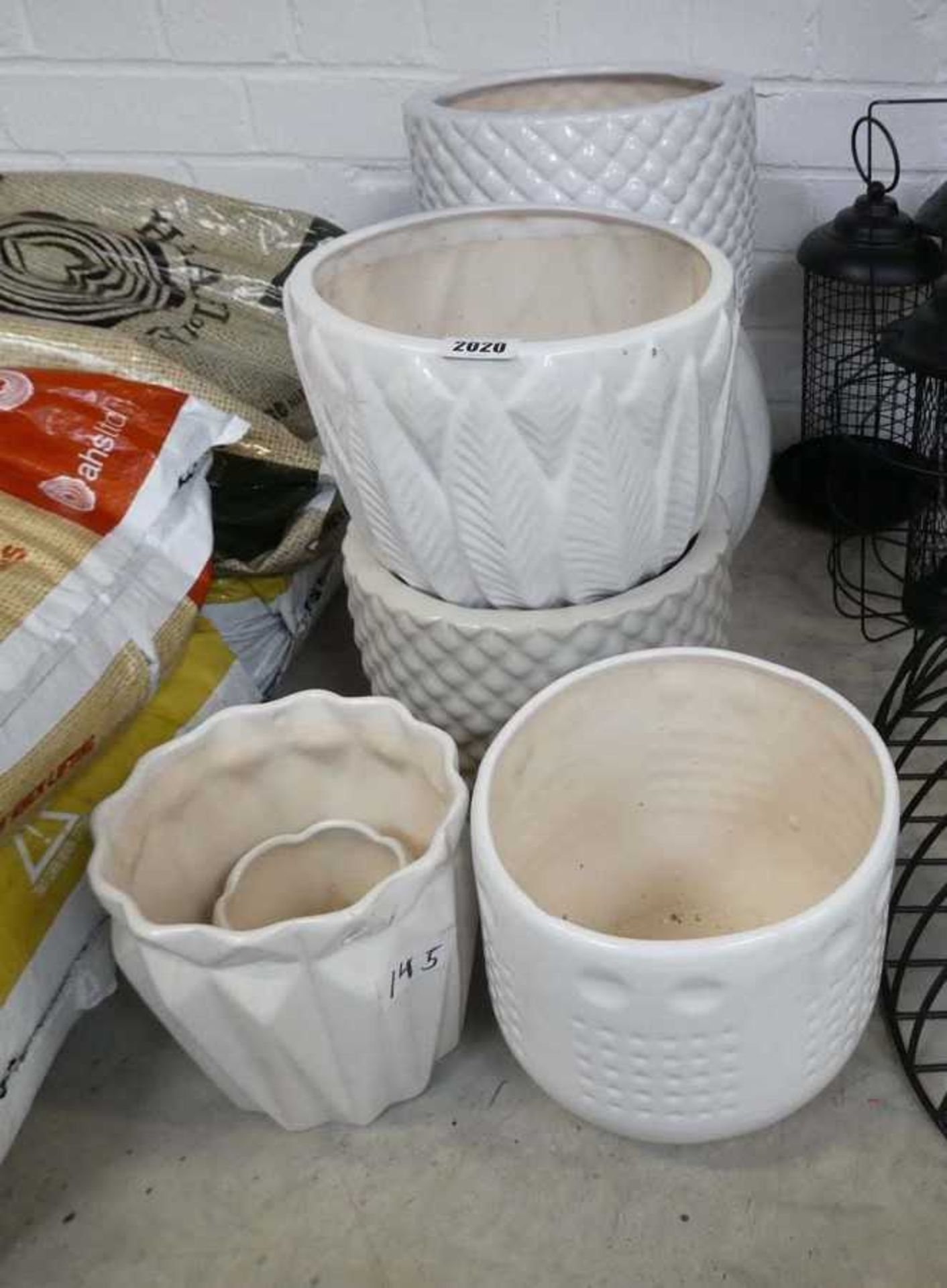 Set of 6 white ceramic glazed garden pots in mixed styles and sizes