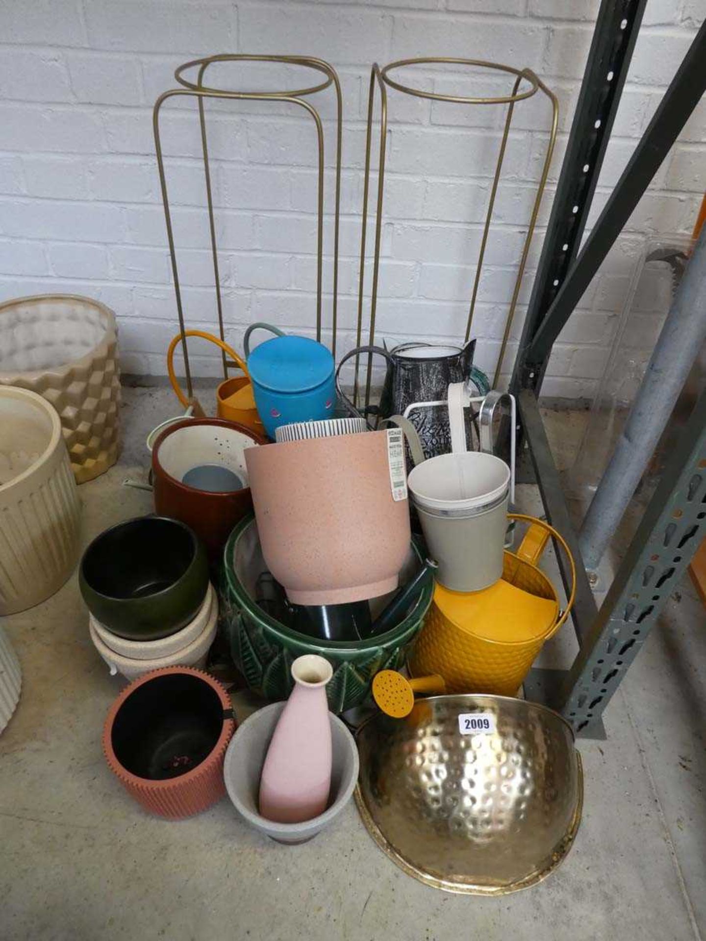 Collection of various modern garden pots in mixed sizes, together garden ornamental items to include