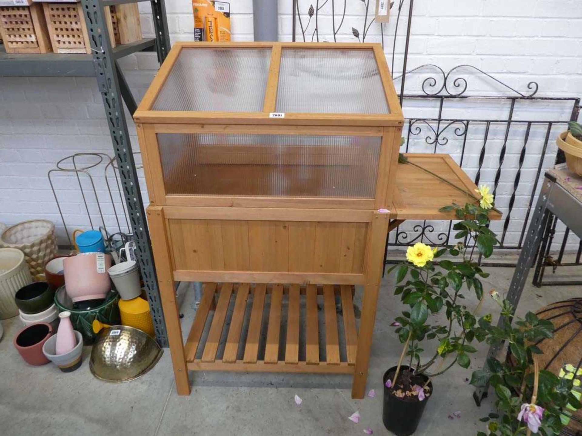 Wooden lift-top cold frame with shelf under
