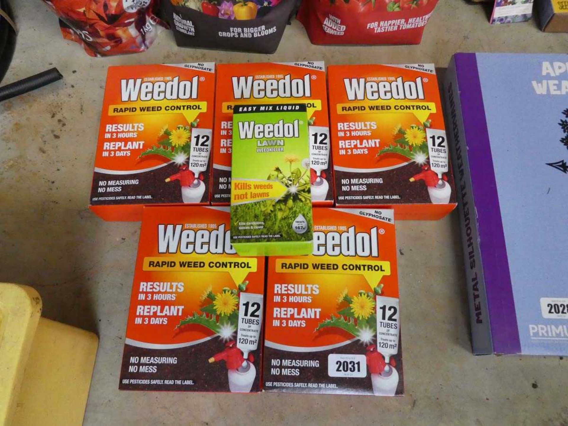 5 boxes of Weedol rapid week control and a box of Weedol lawn weed killer