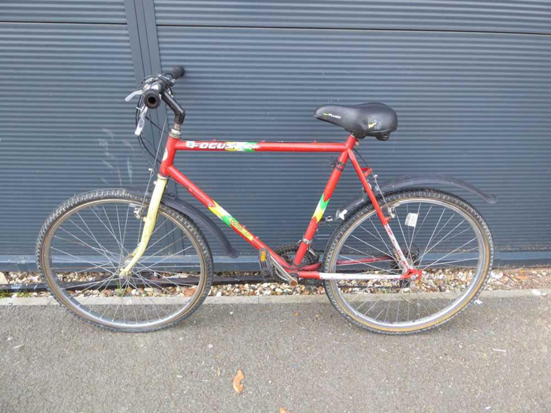 Red and yellow gents bike