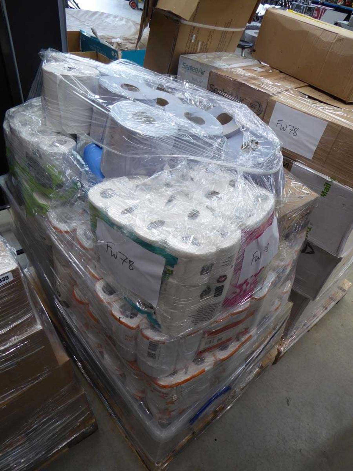 Pallet containing blue roll, white roll, toilet roll and other cleaning items
