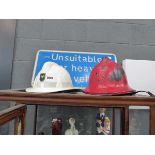 2 fireman's helmets (1 white and 1 red)