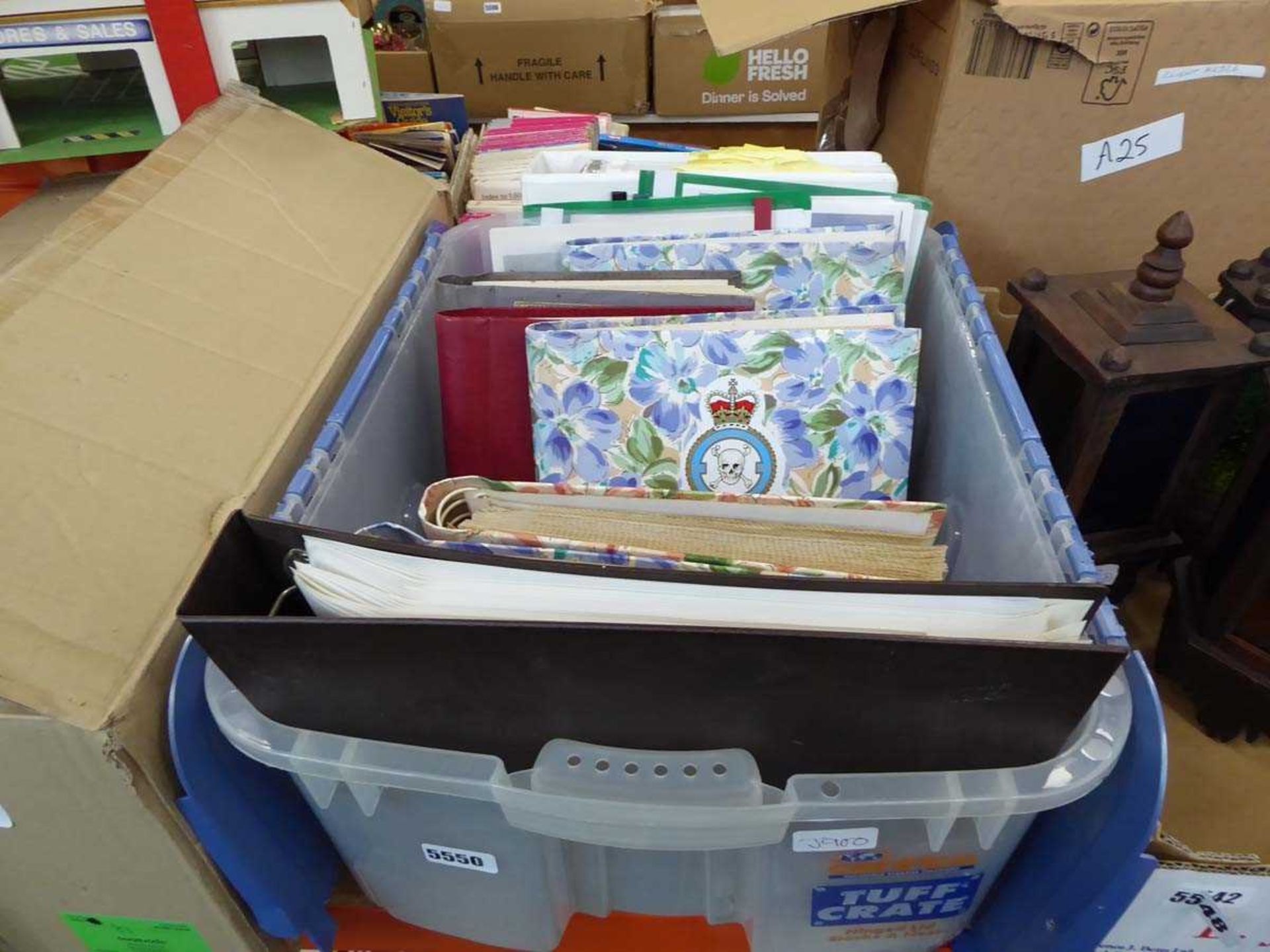 Box containing photo albums with photos of aircraft