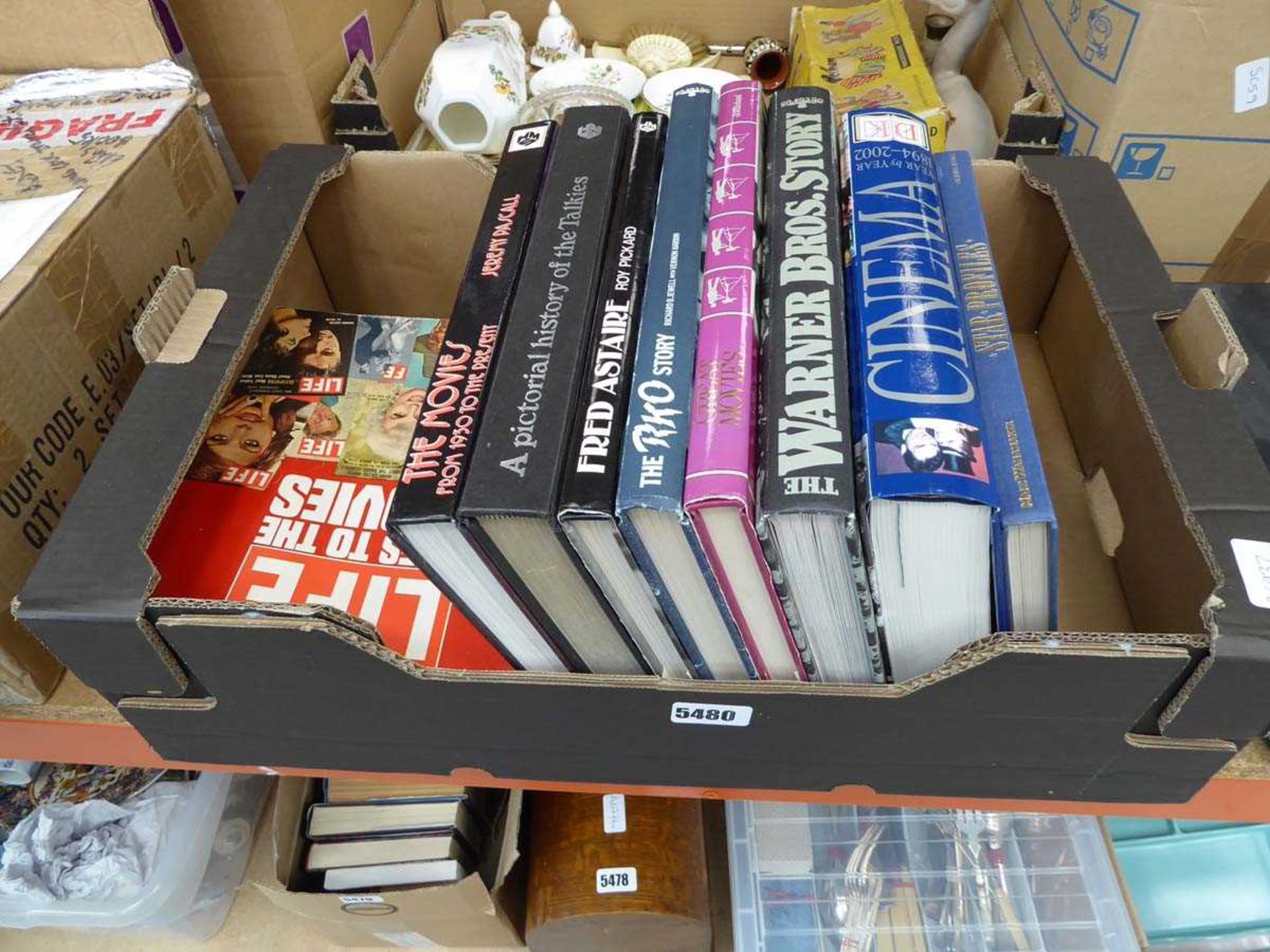 Box containing cinema reference books