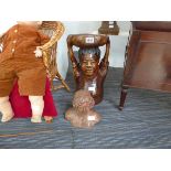 Carved African wooden figure. Plus a terracotta bust