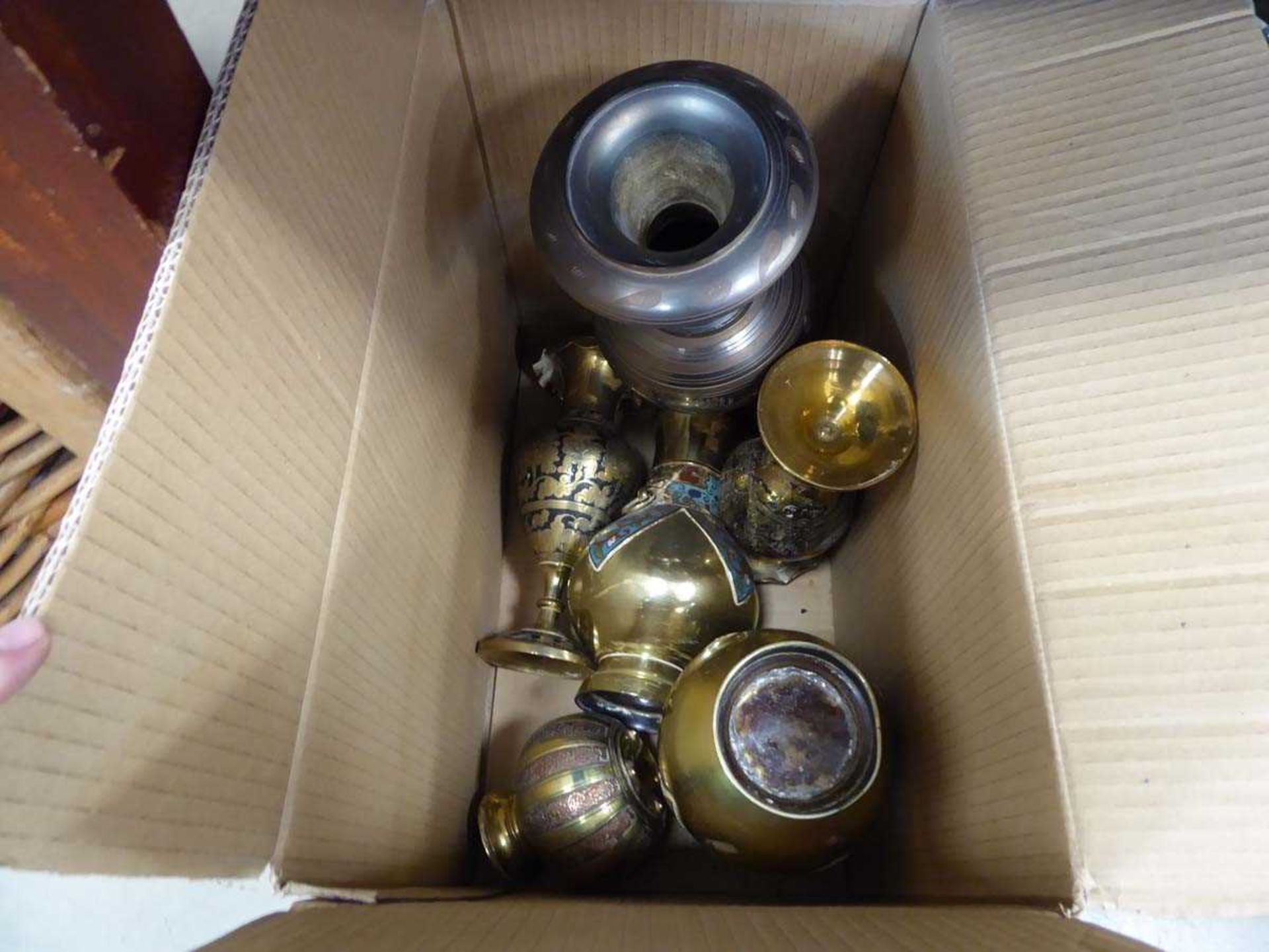 Box containing middle eastern brass vases and vessels