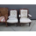 Pair of upholstered 1920s armchairs