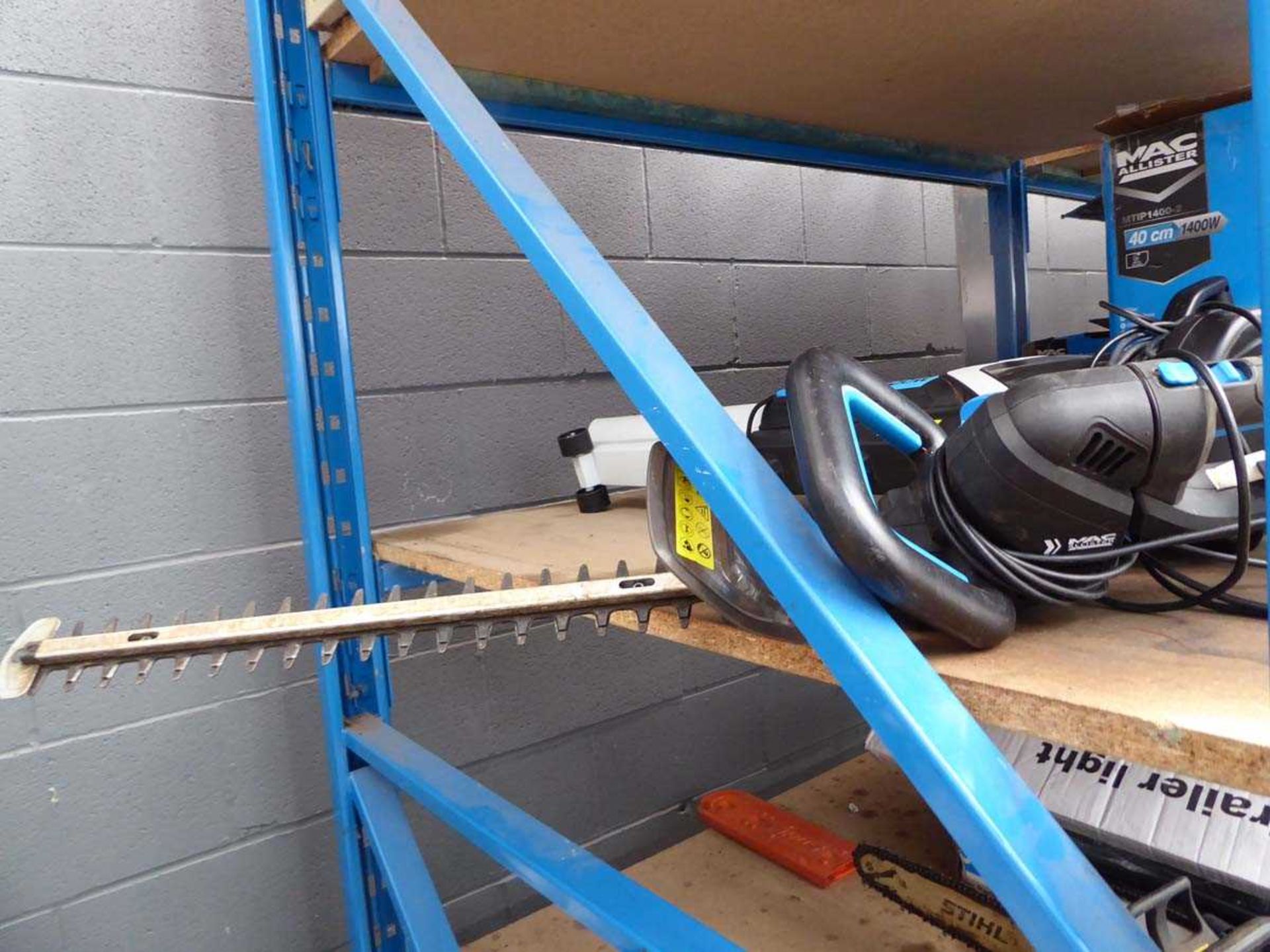 Shelf containing McAllister chainsaw , garden tiller, 2 hedge cutters and blow vac - Image 4 of 4