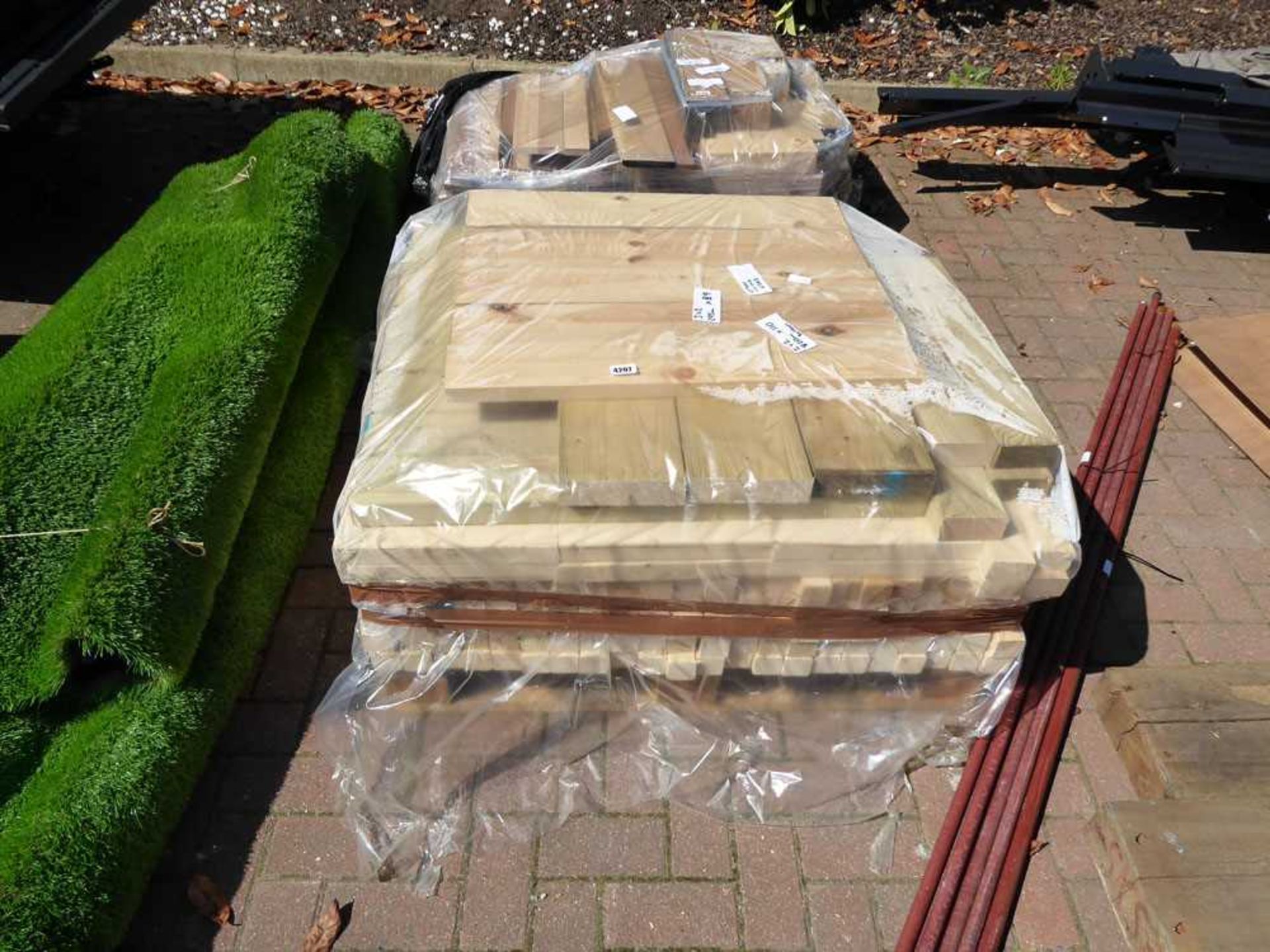 Pallet containing wooden offcuts