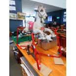 Painted metal rocking horse