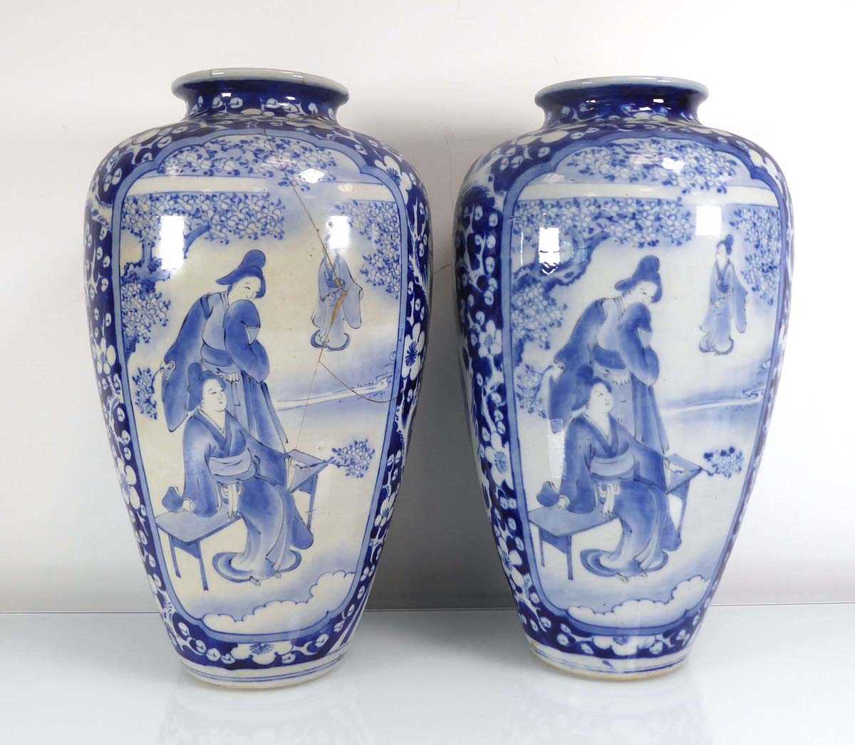 A pair of Chinese blue and white shouldered vases, each decorated with traditional figures at - Image 3 of 5