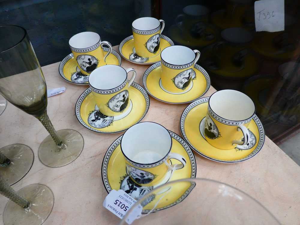 A set of six Lawleys coffee cans and saucers, each decorated with a classical female figure in