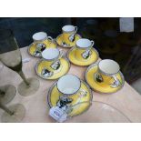 A set of six Lawleys coffee cans and saucers, each decorated with a classical female figure in