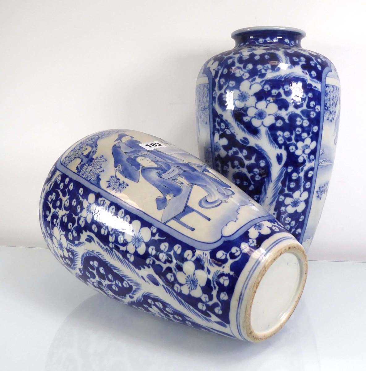 A pair of Chinese blue and white shouldered vases, each decorated with traditional figures at - Image 5 of 5