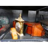 Cage containing wall clock plus barometer and small mantle clock