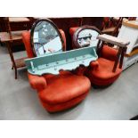 Pair of scrolled orange fabric armchairs