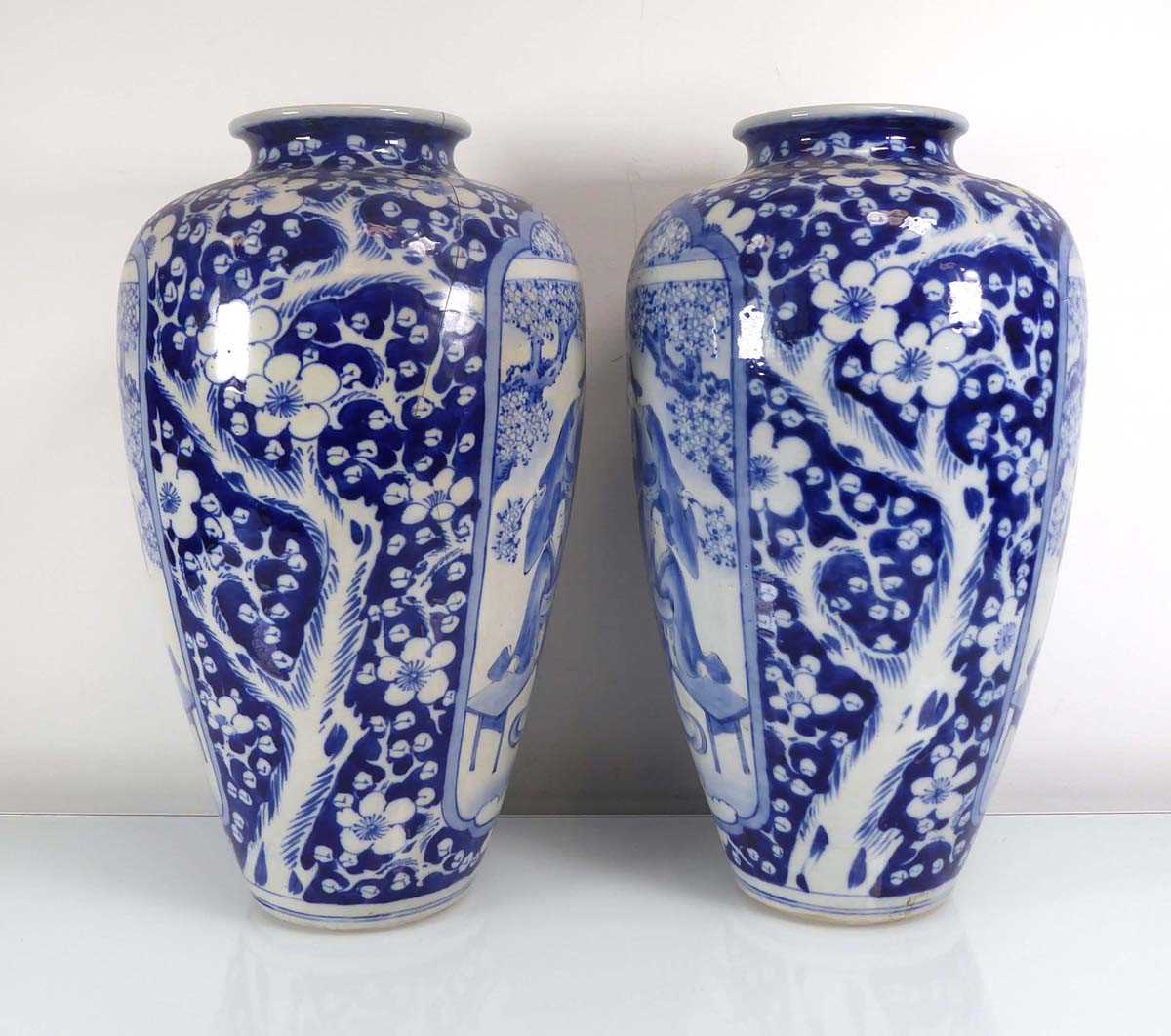 A pair of Chinese blue and white shouldered vases, each decorated with traditional figures at - Image 2 of 5