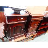 2 dark wood bedside cabinets