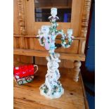 Ornate porcelain three branch candlestick with mother and child to column