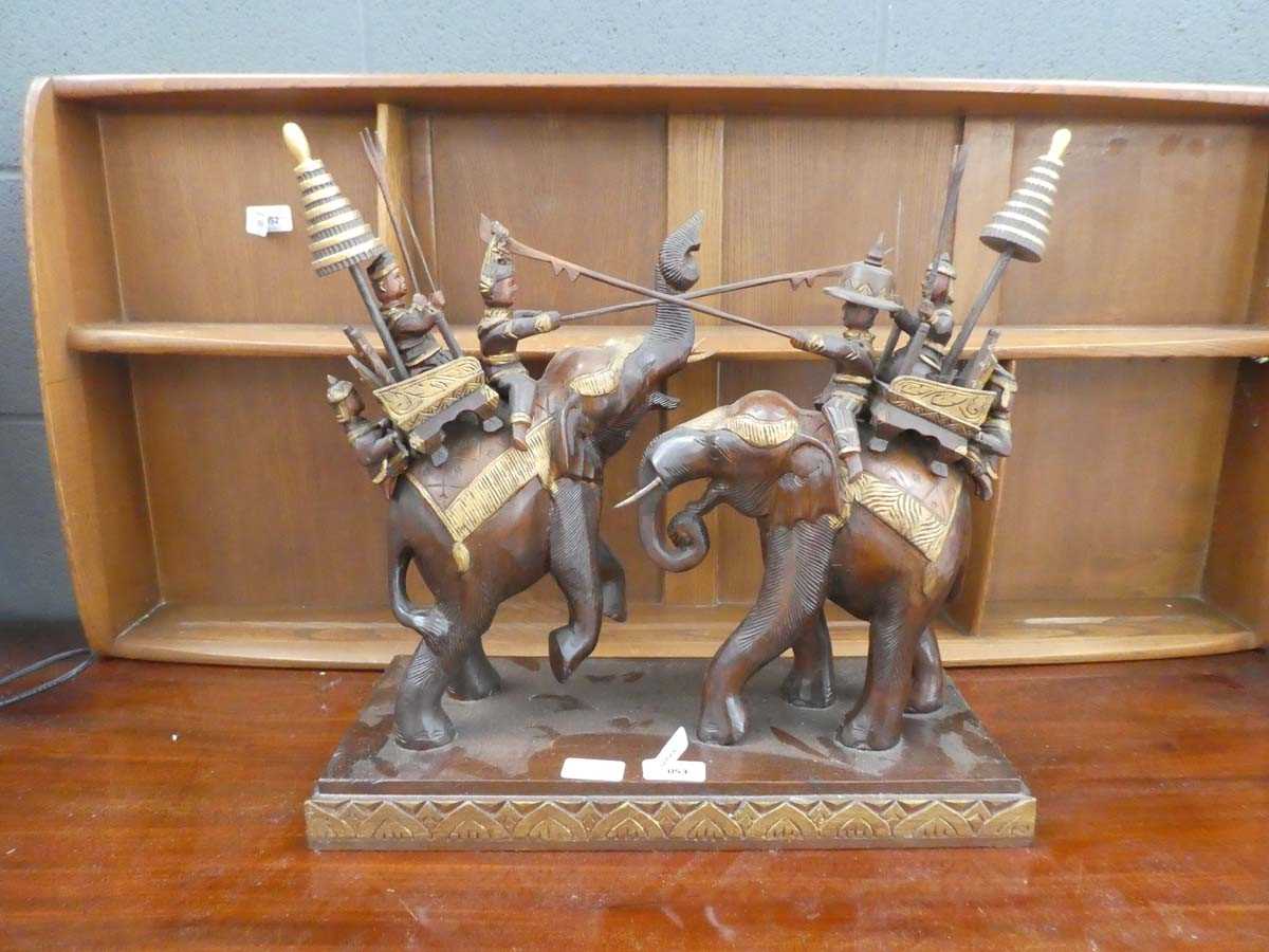 Pair of carved wooden Indian fighting elephants