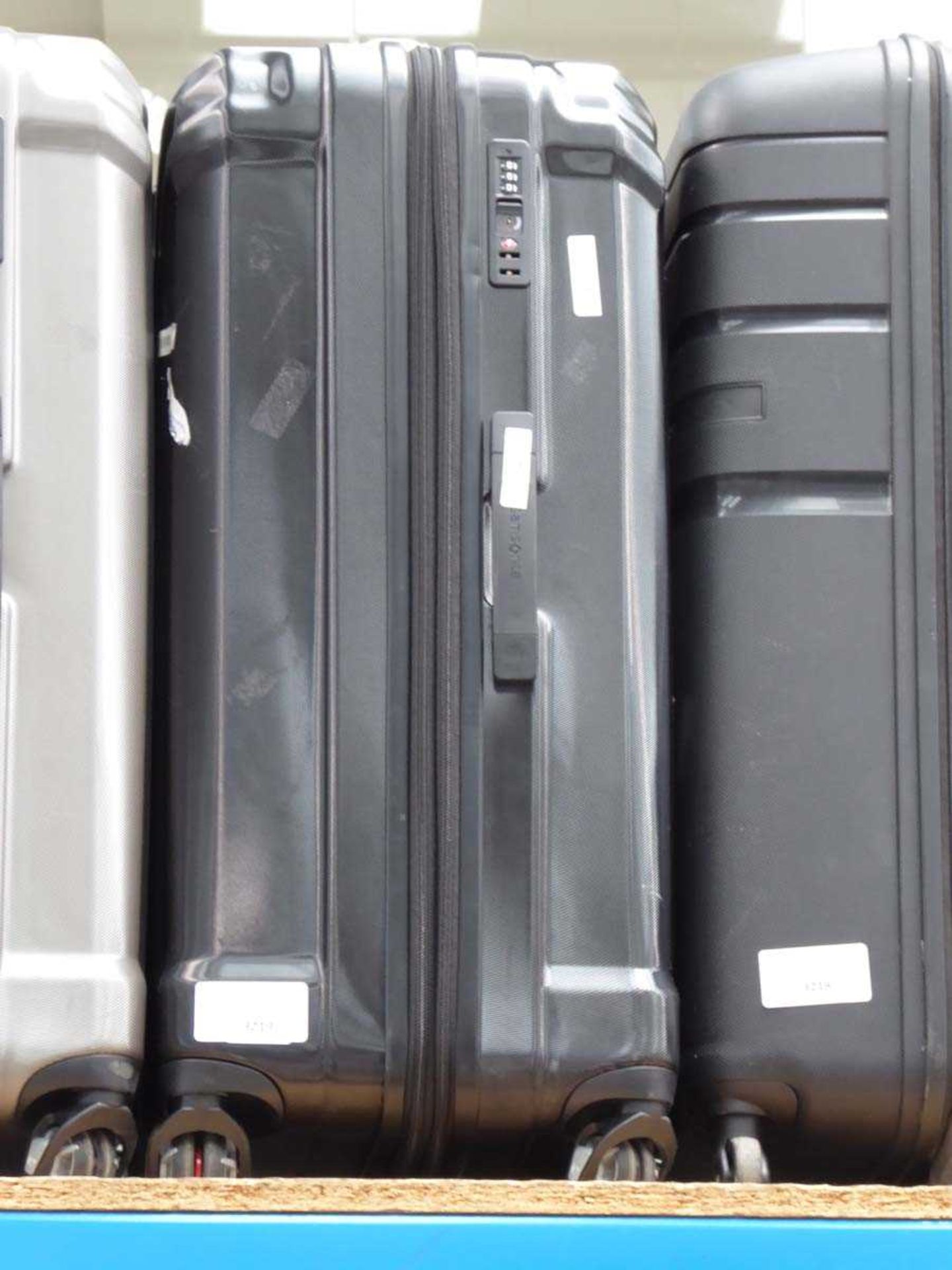 +VAT Large hard shelled Samsonite suitcase