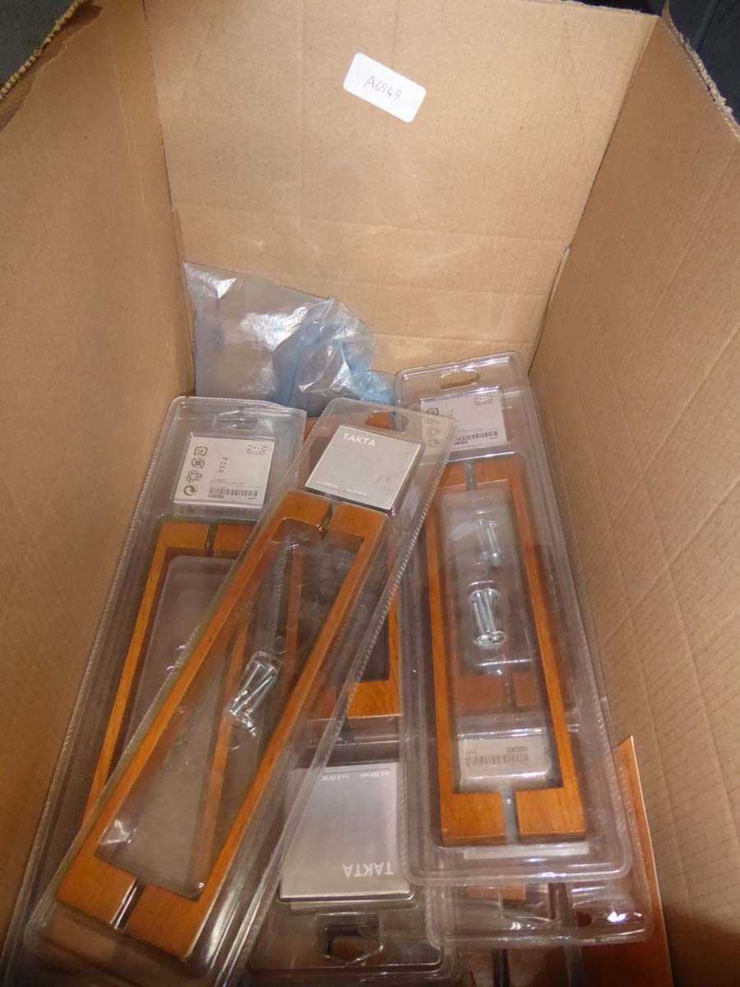 Box of Ikea wooden door handles