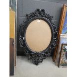 Ornate plastic mirror frame