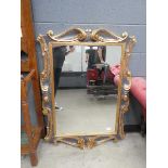 Rectangular mirror in ornate gilt frame