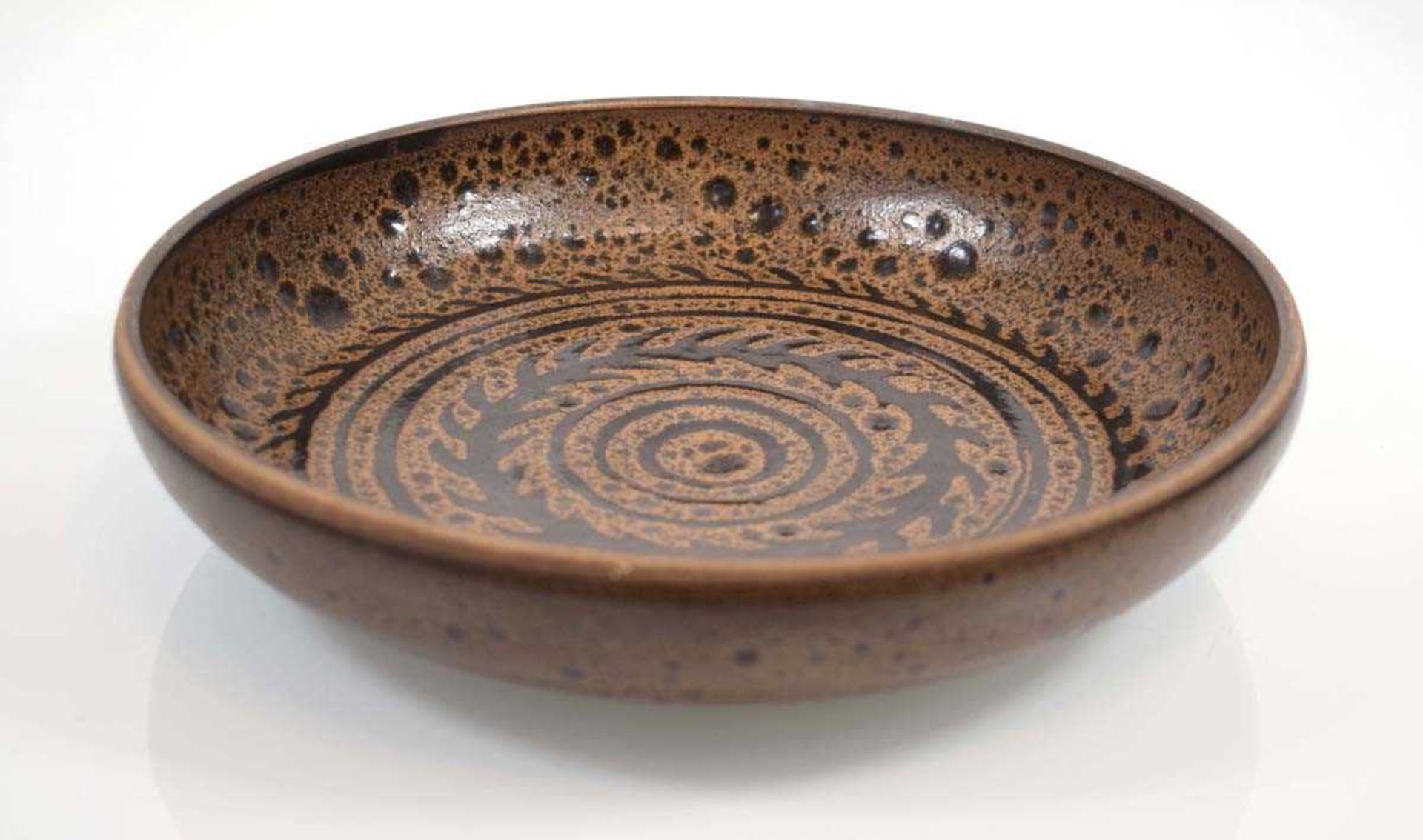 Eric Stockl for Helyg Pottery, a 1970's bowl decorated with stylised bands, incised marks, d. 24 cm