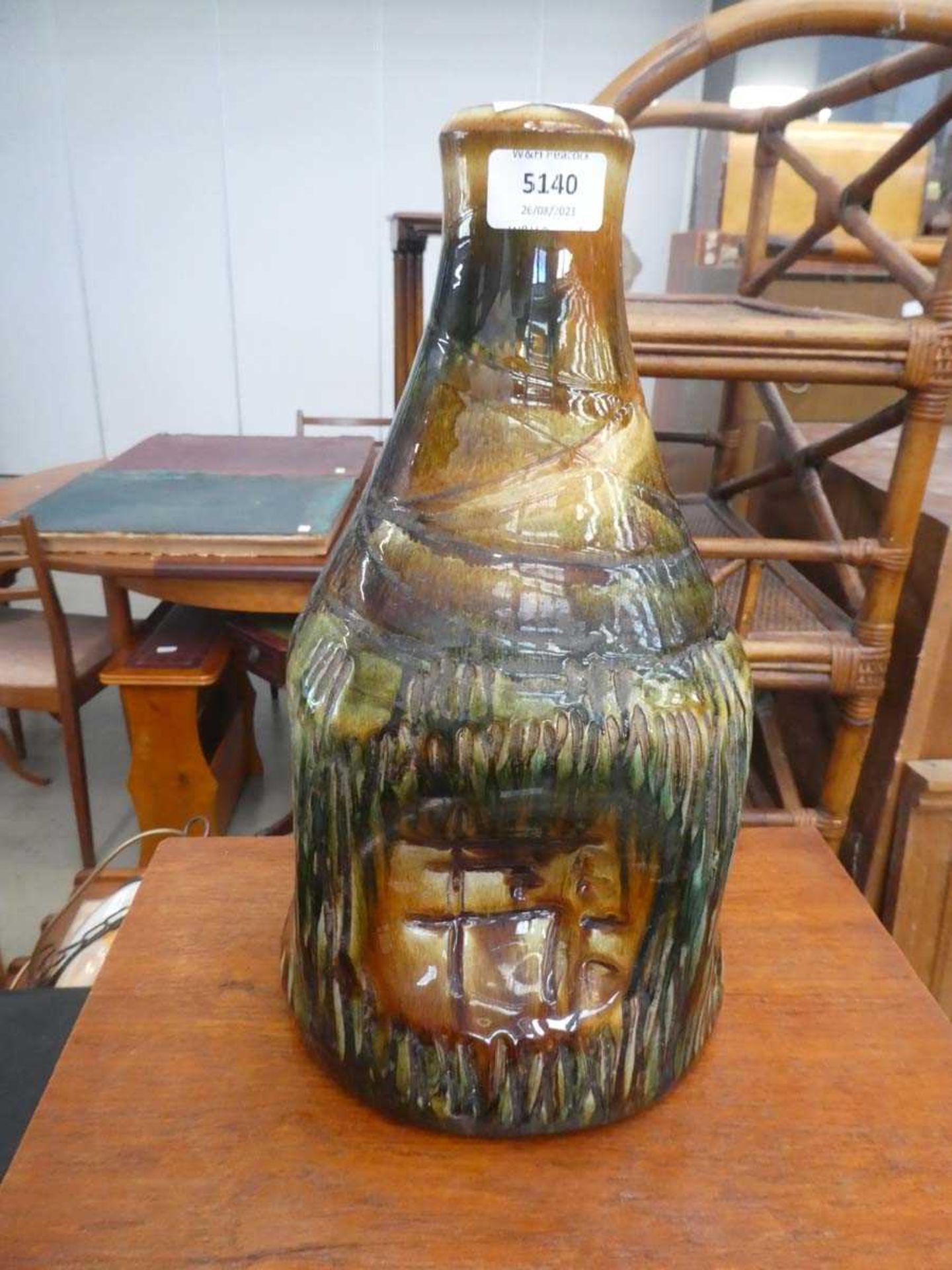 Earthenware lamp base decorated with brown and green glazes