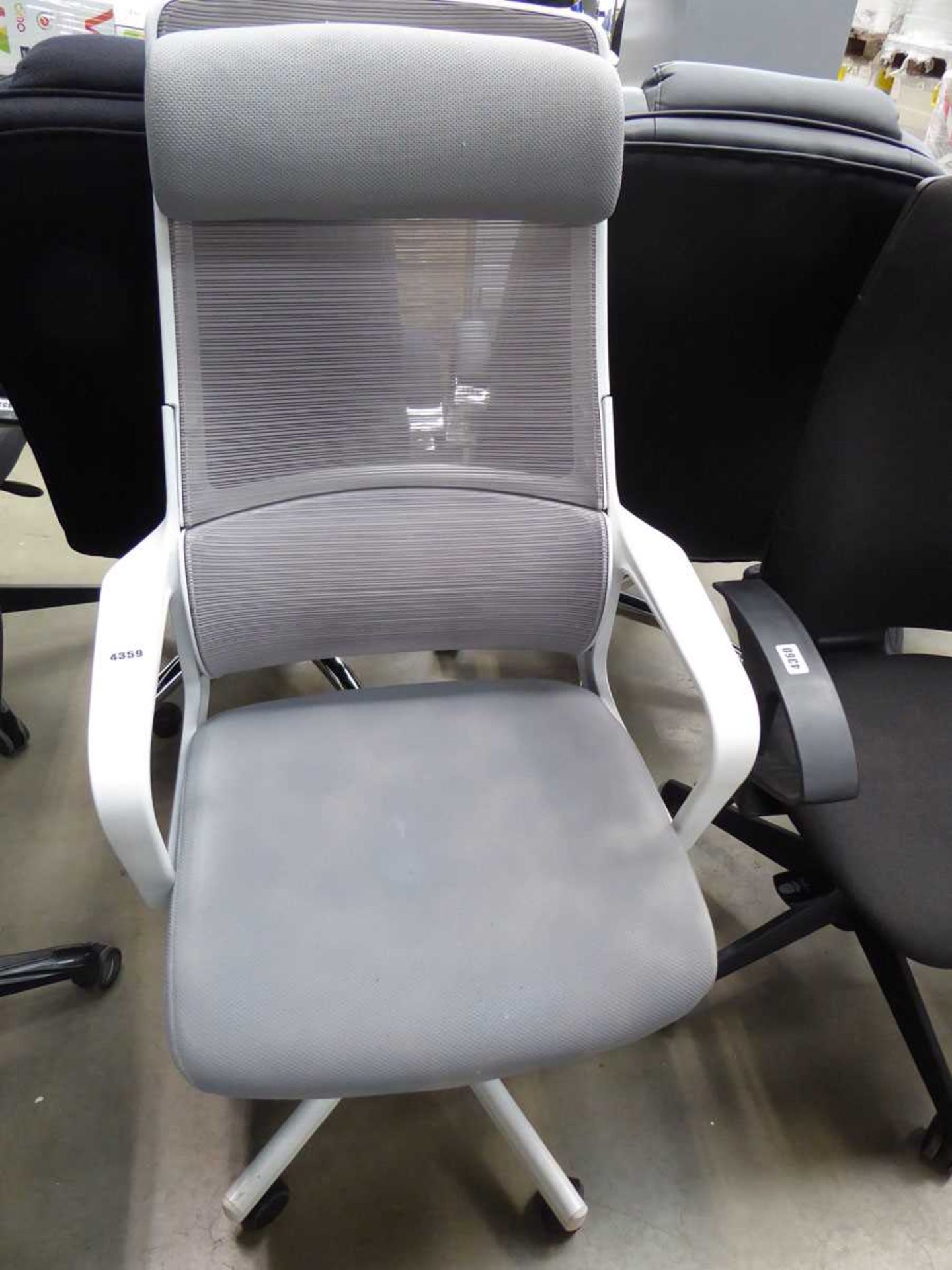 White and grey cloth mesh back swivel armchair