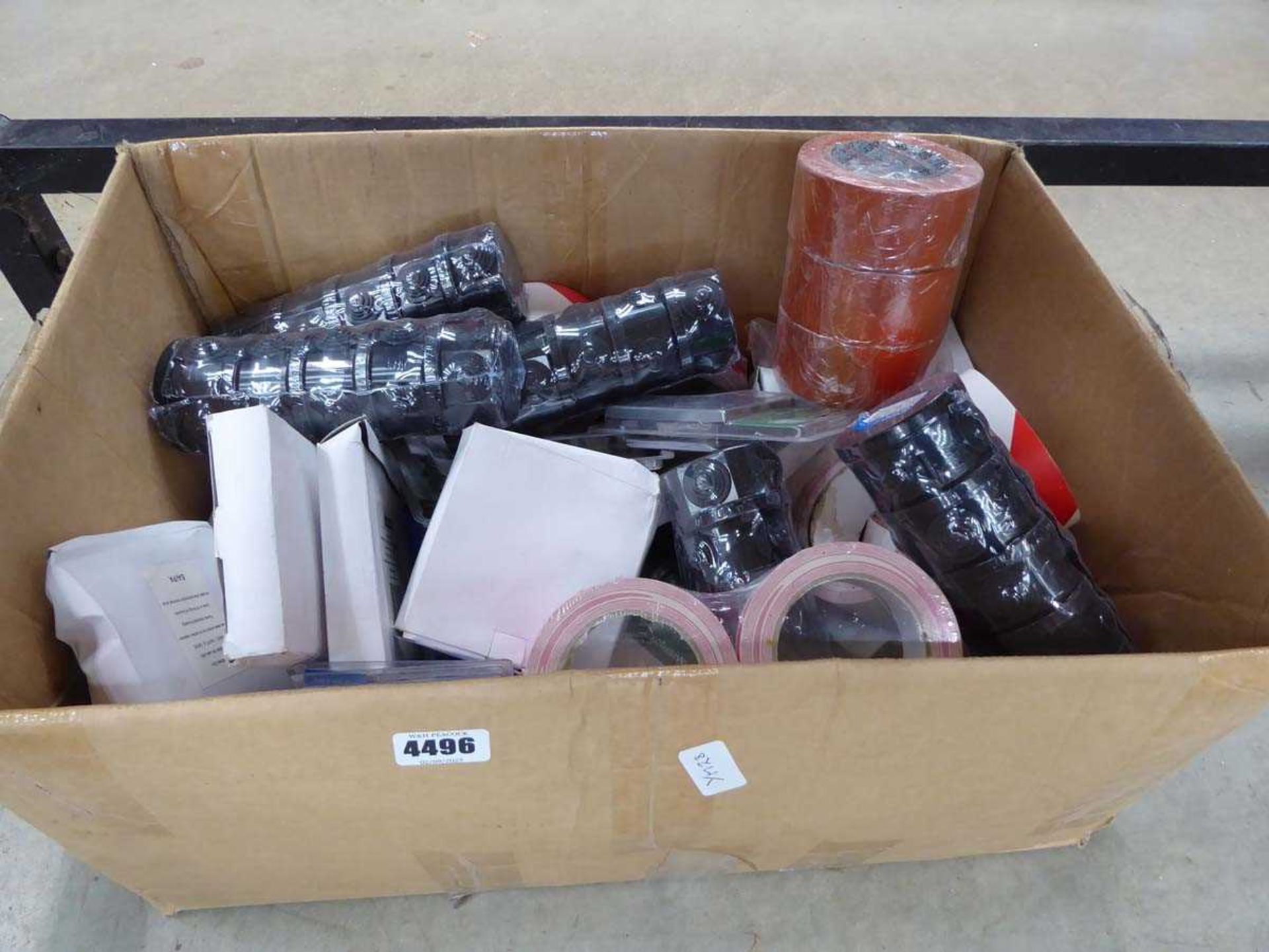 Box of assorted tapes and electrical items