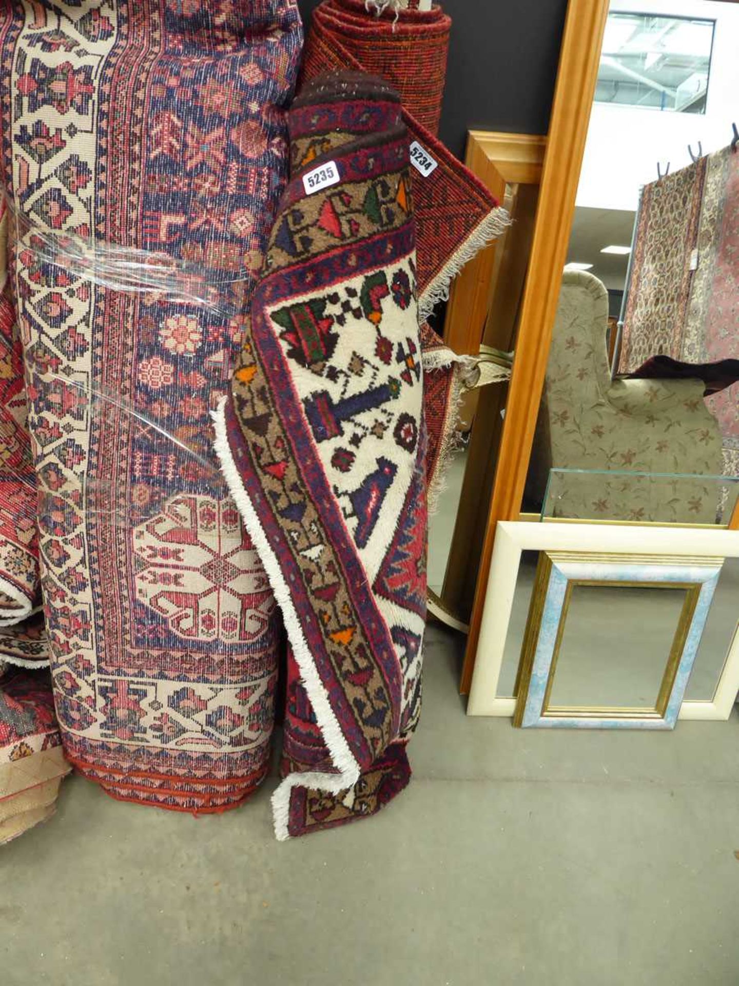 An Iranian rug with a red ground and stylised motifs, 153 x 96 cm - Image 2 of 2