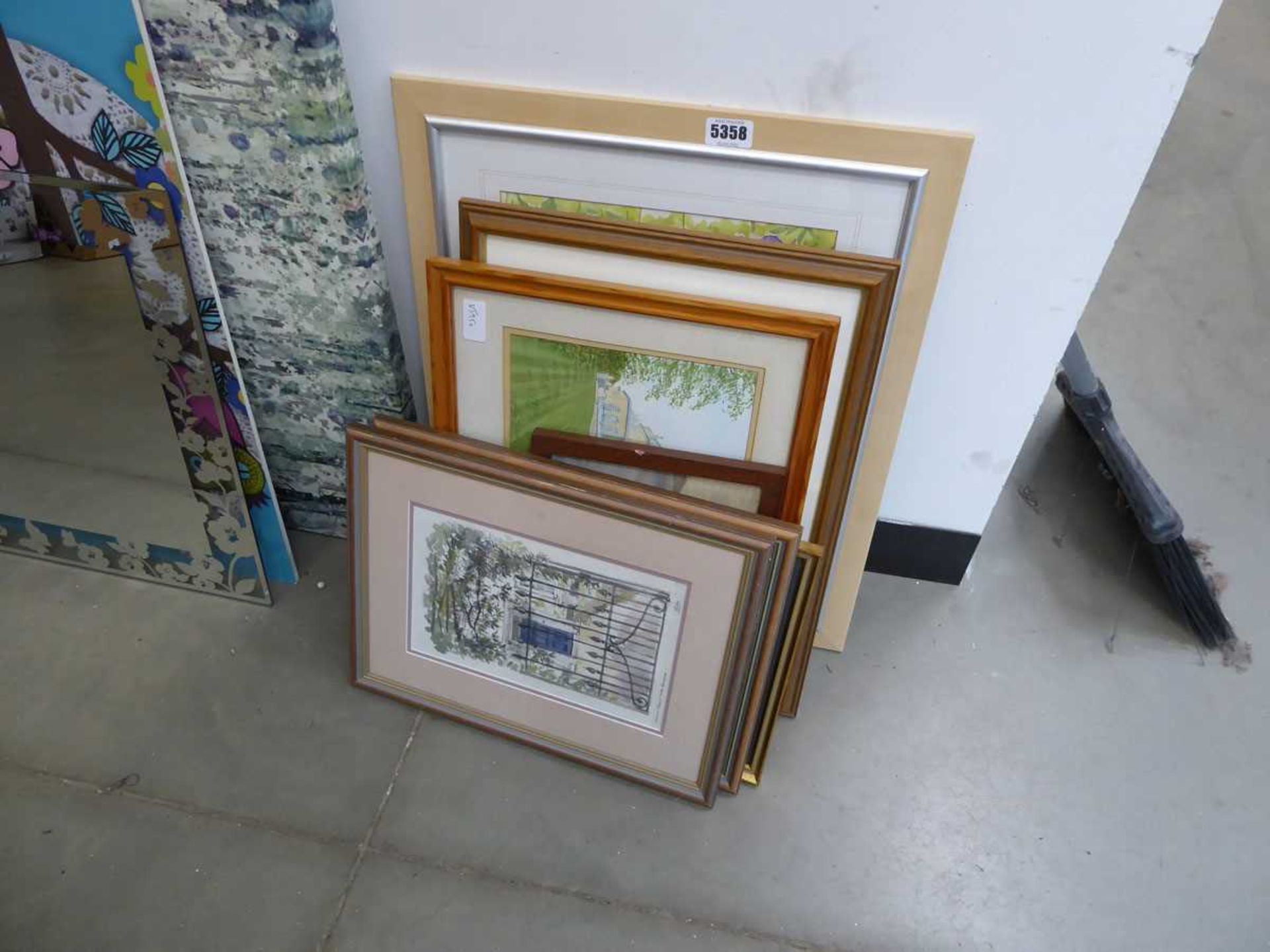 Quantity of prints and paintings to include townscapes and village scenes, stately home, coastal and