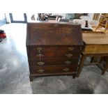 Dark oak writing bureau with 4 drawers