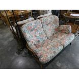 4 piece Ercol wooden framed lounge suite comprising 2 seater sofa, 2 matching armchairs with loose
