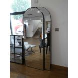 +VAT Two arched top black framed floor standing mirrorsminor damage to one mirror