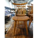 4 stick back dining chairs in the style of Ercol