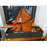 Remote control model sailing boat in fitted wooden box with similar tug (both models are partially