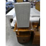 Walnut effect single door bedside and a white painted Lloyd Loom style laundry basket