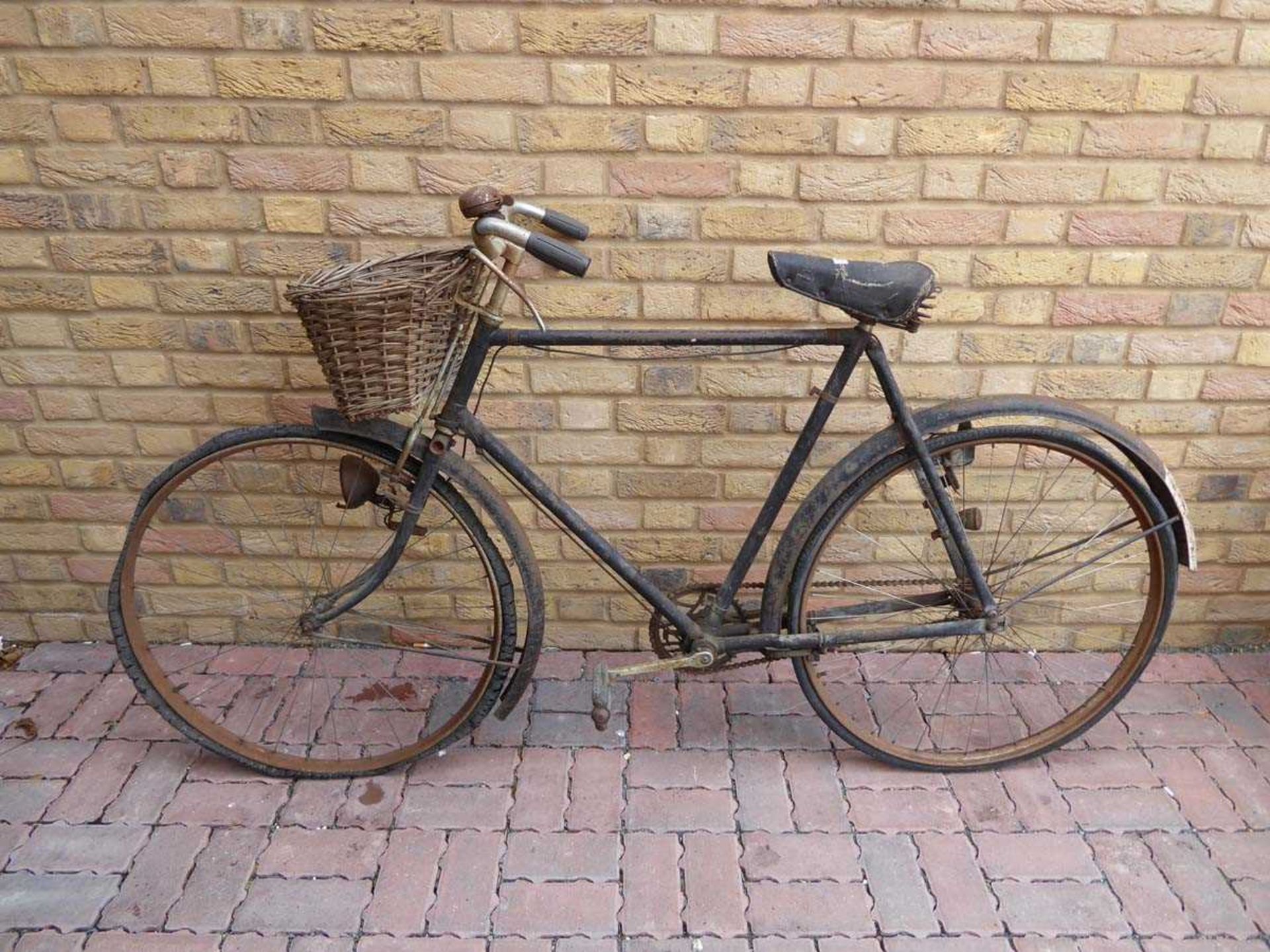Vintage gents black bike with basket