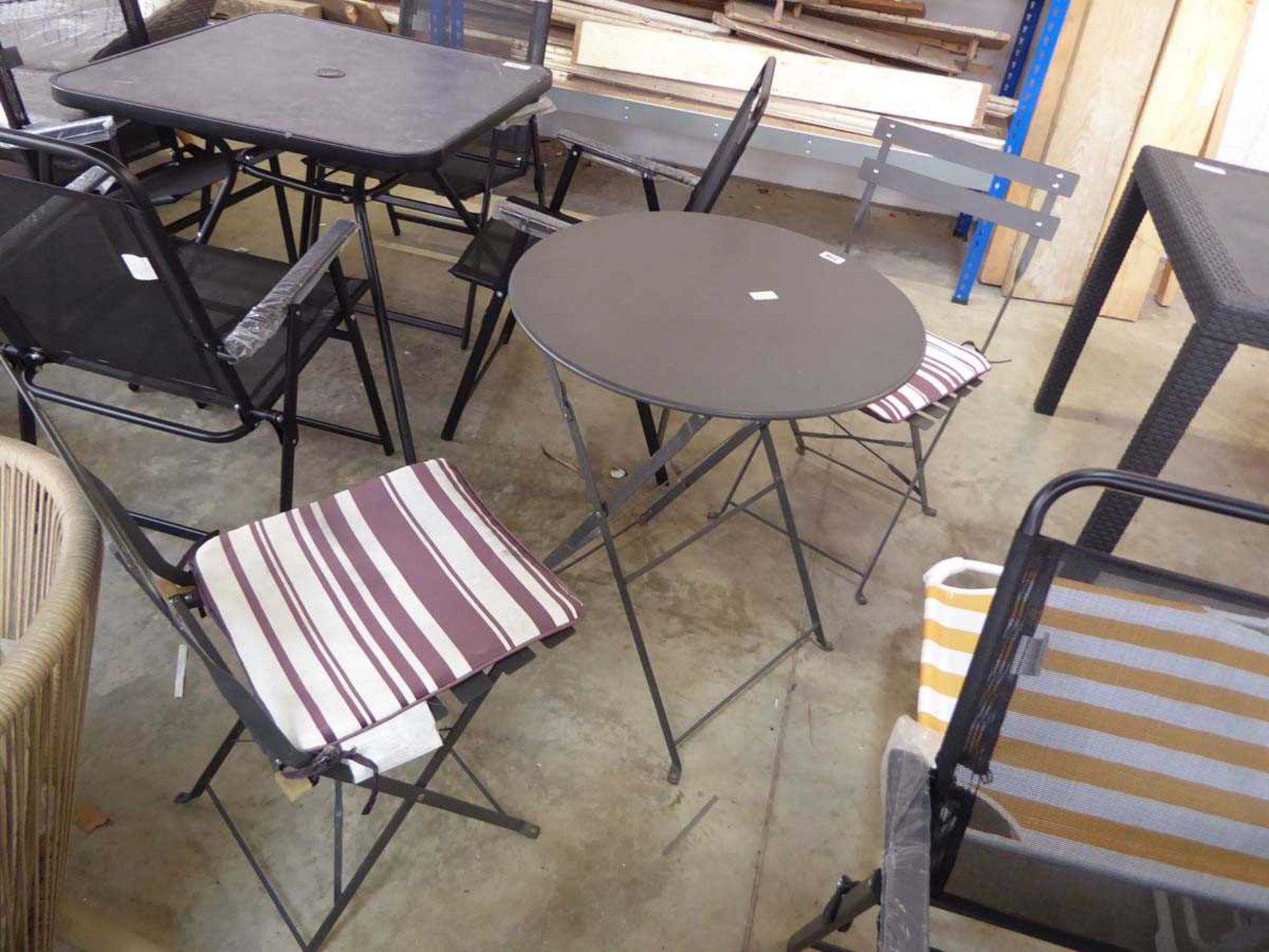 Metal garden table with 2 matching chairs and cushions