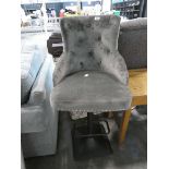 Modern grey velvet bar stool on metal support