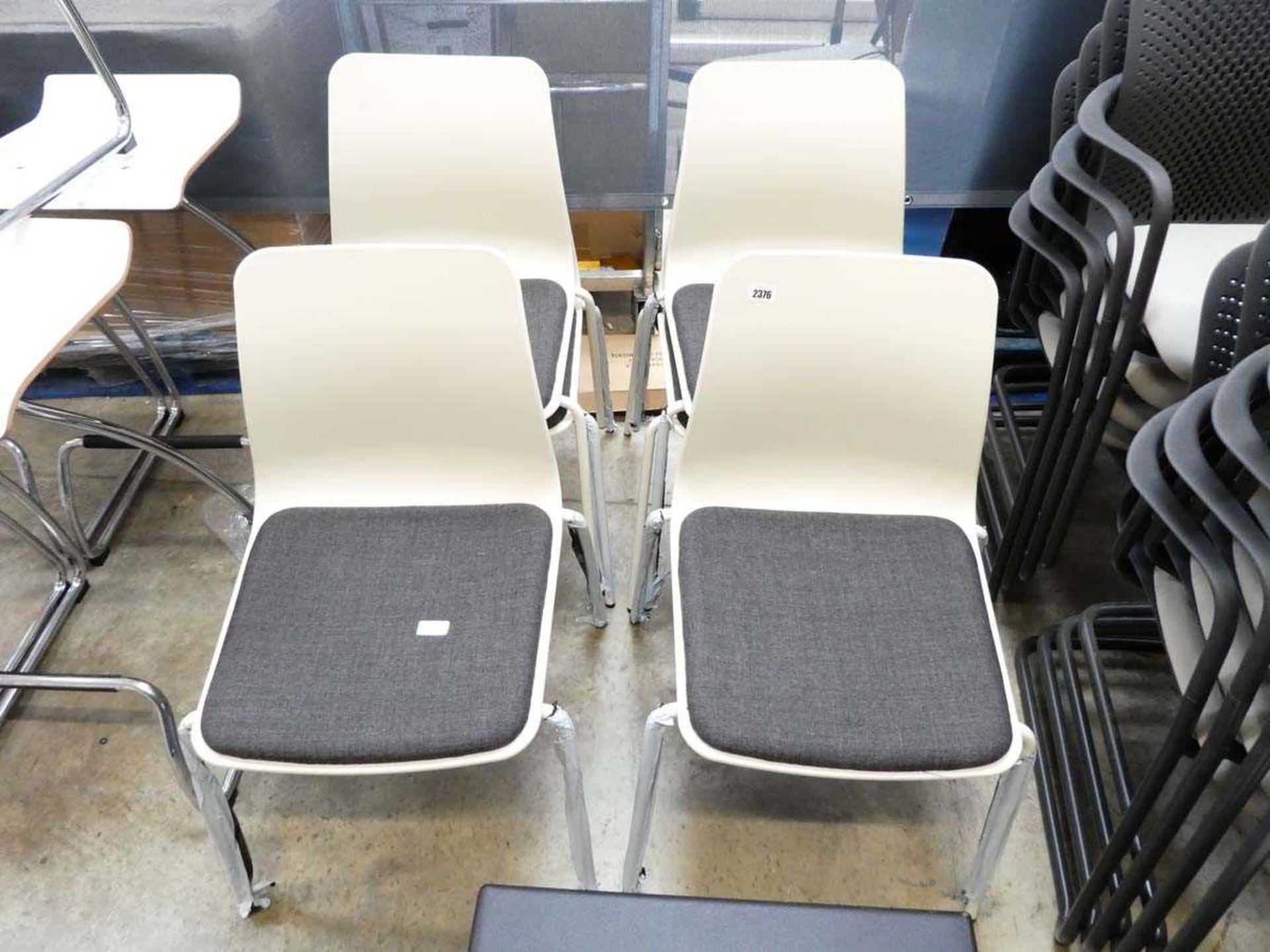 Set of 6 Naughtone cream and black coloured stacking chairs