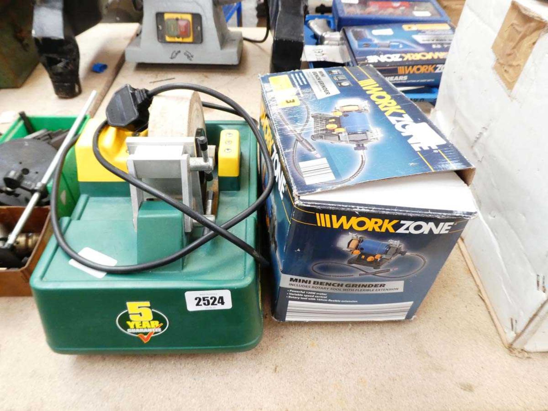 Boxed Workzone mini bench grinder with electric tool sharpener